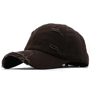 Vintage distressed brown baseball cap with ripped details and a curved brim for men and women