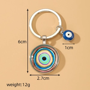 Vintage evil eye keychain with blue round glass pendant and 6cm total length measurements