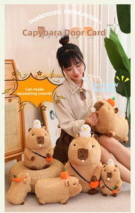 Close-up of capybara plush toys with functional squeaking and bubble blowing features