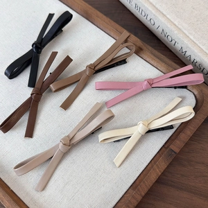 Minimalist vintage faux leather bow hair clips in five assorted earthy colors