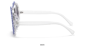 Detail view of purple daisy flower sunglasses showing the temple connection and back profile