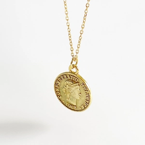 Minimalist gold coin pendant necklace with vintage Helvetia goddess relief on chain