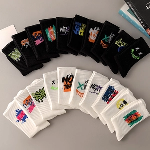 Men's cotton crew socks with street graffiti patterns in black and white colors
