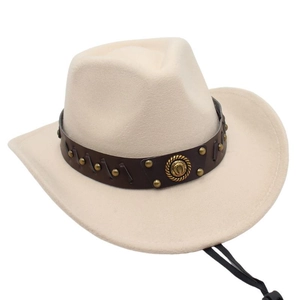 Detail of cream wool felt western hat with studded leather band and horseshoe emblem