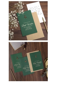 Detail of vintage green greeting cards with gold metal charms and brown envelopes