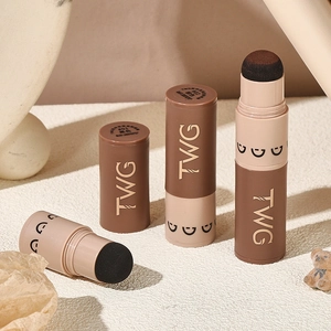 TWG hairline shadow powder sticks in black and brown shades with sponge tip applicator