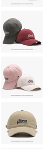 Detailed view of Cherie letter embroidery on six-panel cotton baseball caps
