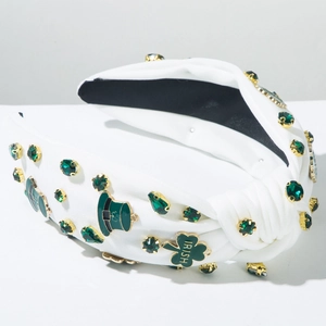 Detail of St. Patrick’s Day headband featuring green gems and Irish clover charms