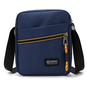 Deep blue lightweight Oxford crossbody bag for men with yellow zipper accents and wide strap
