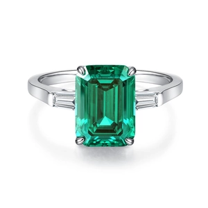 Elegant S925 sterling silver ring with 5 carat emerald-cut green gemstone on white background