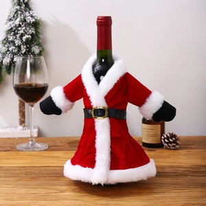 Detail of plush Santa suit wine bottle cover with black belt and fuzzy white trim