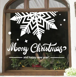 Detailed white Christmas snowflake window decal with Merry Christmas text on glass