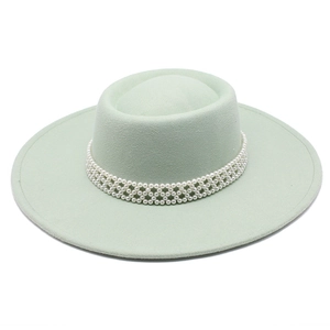 Detail of mint green wool felt hat featuring elegant multi-layer pearl bead band decoration