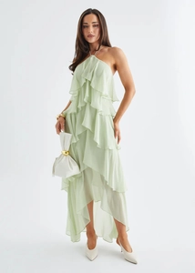 Detail of light green chiffon tiered ruffle halter dress with an elegant waist design