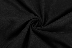 Macro detail of high-elastic black knitted fabric texture with subtle silk sheen