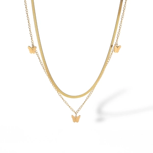 Detail of 18K gold-plated double-layer necklace with snake chain and butterfly pendants