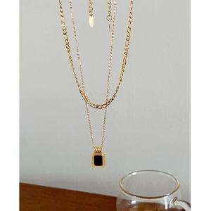 Double-layered 18k gold plated titanium steel necklace with black rectangular pendant