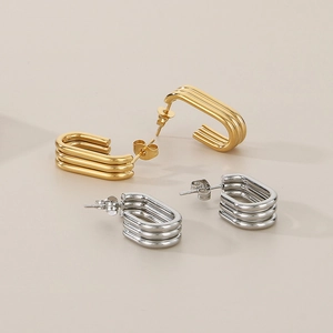Three-layered oval hoop earrings in 18K gold and silver plated stainless steel
