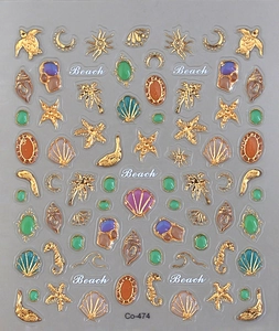 Detail of 3D gold embossed sea turtle and shell nail art stickers with colorful gems