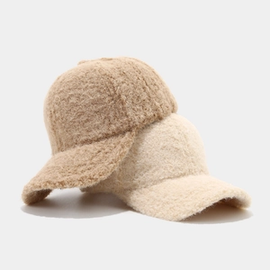 Thick faux shearling baseball cap in solid camel and beige colors for winter warmth