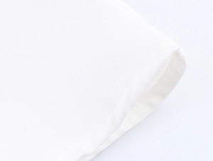 Detailed close-up of white fabric texture and premium stitching on elegant fishtail dress