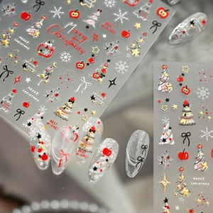 Autocollants ongles Noël avec pommes rouges, sapins dorés et flocons en relief 3D