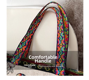 Close-up of bohemian woven handle and floral embroidery on a canvas tote bag