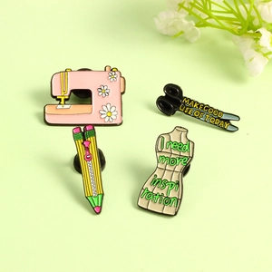 Pink sewing machine, black scissors, pencil, and mannequin enamel lapel pin set