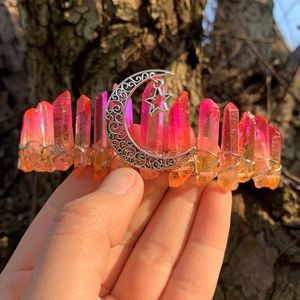 Detail of pink crystal moon crown with silver wire wrapping and star pendant