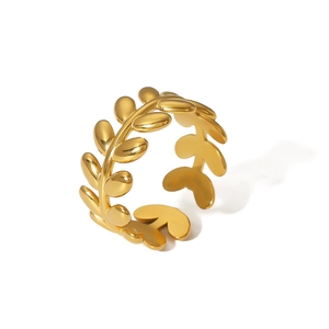 Detail of 18k gold plated olive leaf open ring showing cutout leaf textures