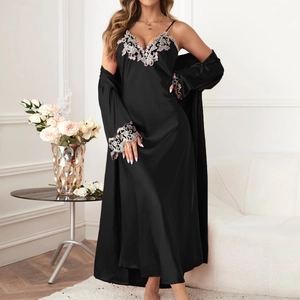 Women's black satin sleepwear set with silk texture and elegant white lace embroidery