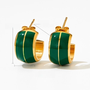 Detail view of green enamel C-shaped gold-plated earrings showing size 14.8mm and 8.8mm