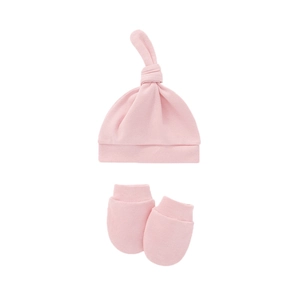 Detail of soft pink cotton newborn knotted beanie hat and matching anti-scratch mittens