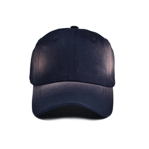Detailed close-up of navy blue baseball cap showing breathable eyelets and twill fabric texture