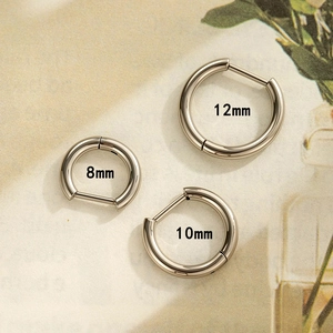 Polished G23 titanium hoop earrings shown in three sizes 8mm 10mm and 12mm