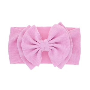 Pink waffle texture double bow baby headband made of soft stretchy knitted fabric