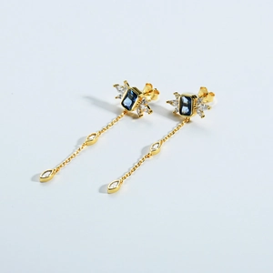 Elegant gold-plated S925 silver wing tassel earrings with blue rectangular stones