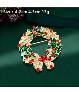 Detailed size view of Christmas wreath brooch with bells and colorful rhinestones