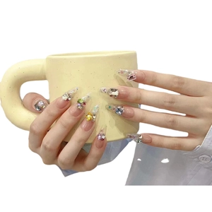 Handmade dopamine crystal press-on nails with colorful rhinestones on transparent base
