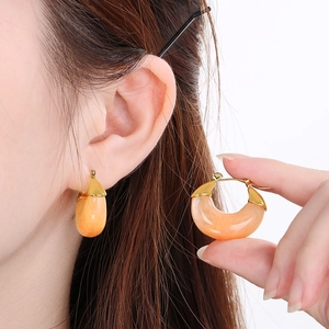 Fashionable U-shaped amber resin earrings with elegant golden metal hardware for women