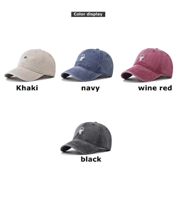 Detailed color display of washed cotton baseball caps with astronaut embroidery patterns