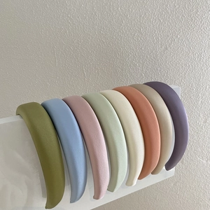Minimalist wide matte headbands in assorted pastel candy colors for women's hair styling