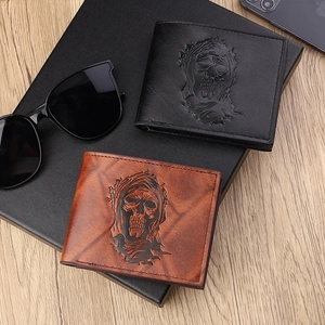 Vintage men's bifold wallets in black and brown leather with embossed skull design