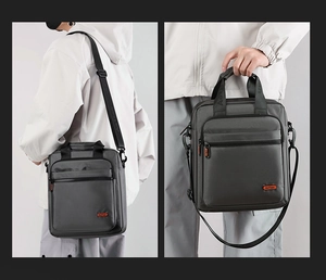 Detailed view of gray business messenger bag with front zipper and nylon texture