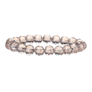 Champagne crystal beaded bracelet with faceted 10mm stones on elastic cord