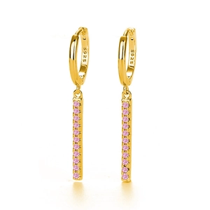 Detailed close-up of S925 hallmark on gold plated drop earrings with pink zircons