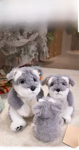 Three realistic Schnauzer plush dolls with fluffy grey fur and detailed black paw prints