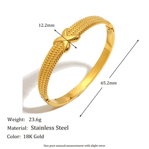 Polished 18K gold plated stainless steel bangle featuring unique X-pattern with dimensions