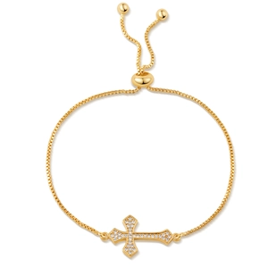 Adjustable gold plated bracelet featuring a cross pendant with sparkling zircon stones