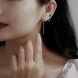 S925 sterling silver tassel earrings with zircon studs shown on a model ear lobe